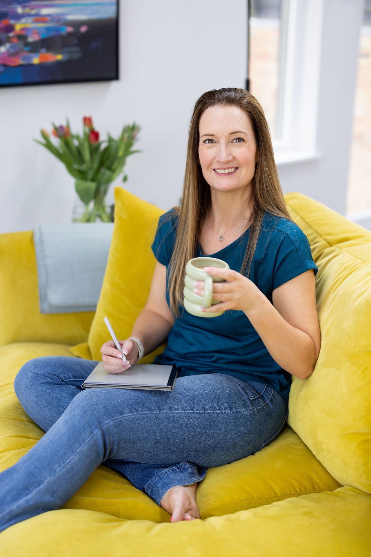 Emma Lovelock holding a mug